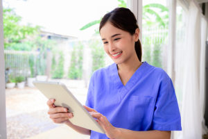 Medical Assistant going over paperwork