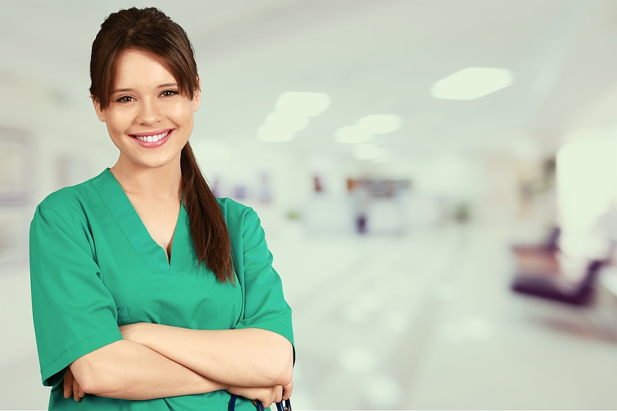 Medical Assistant standing in medical clinic.